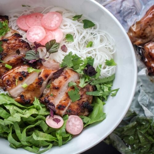 Grilled BC turkey breast over rice noodles with fresh lettuce, cilantro, perilla, and nuoc cham dipping sauce