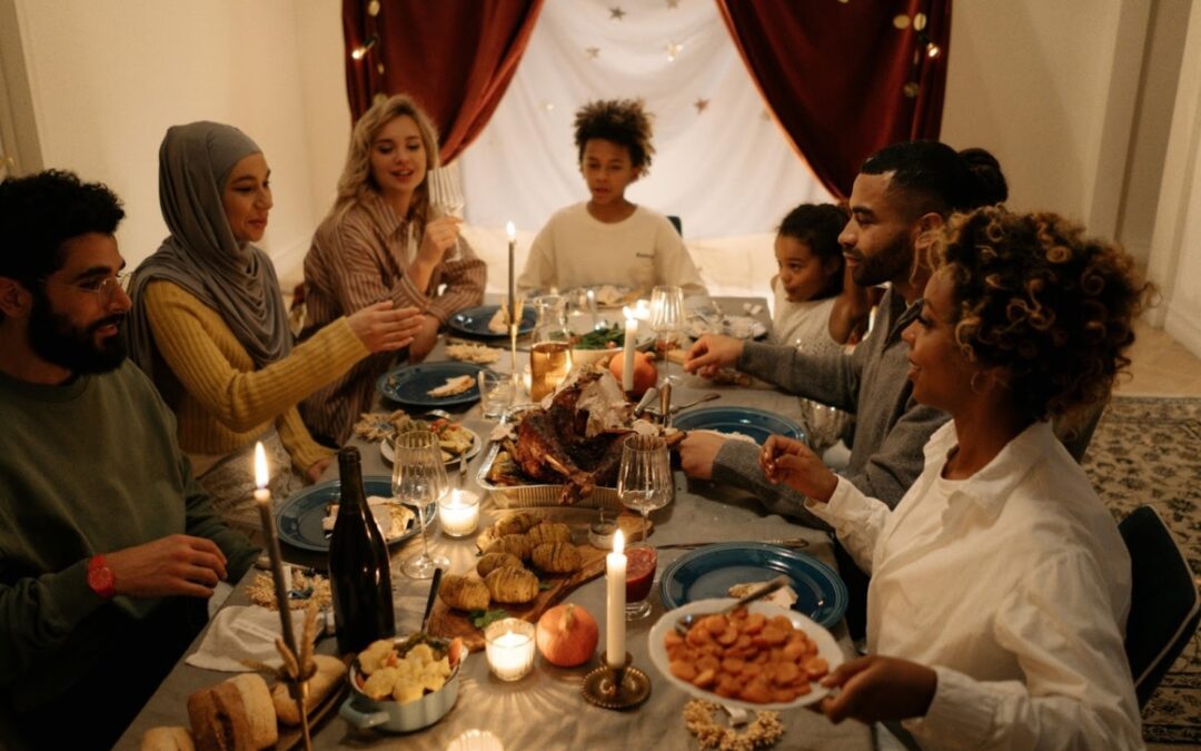 family together at thanksgiving turkey dinner table