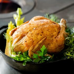 oven-cooked thanksgiving turkey in a bowl of lettuce and other vegetables